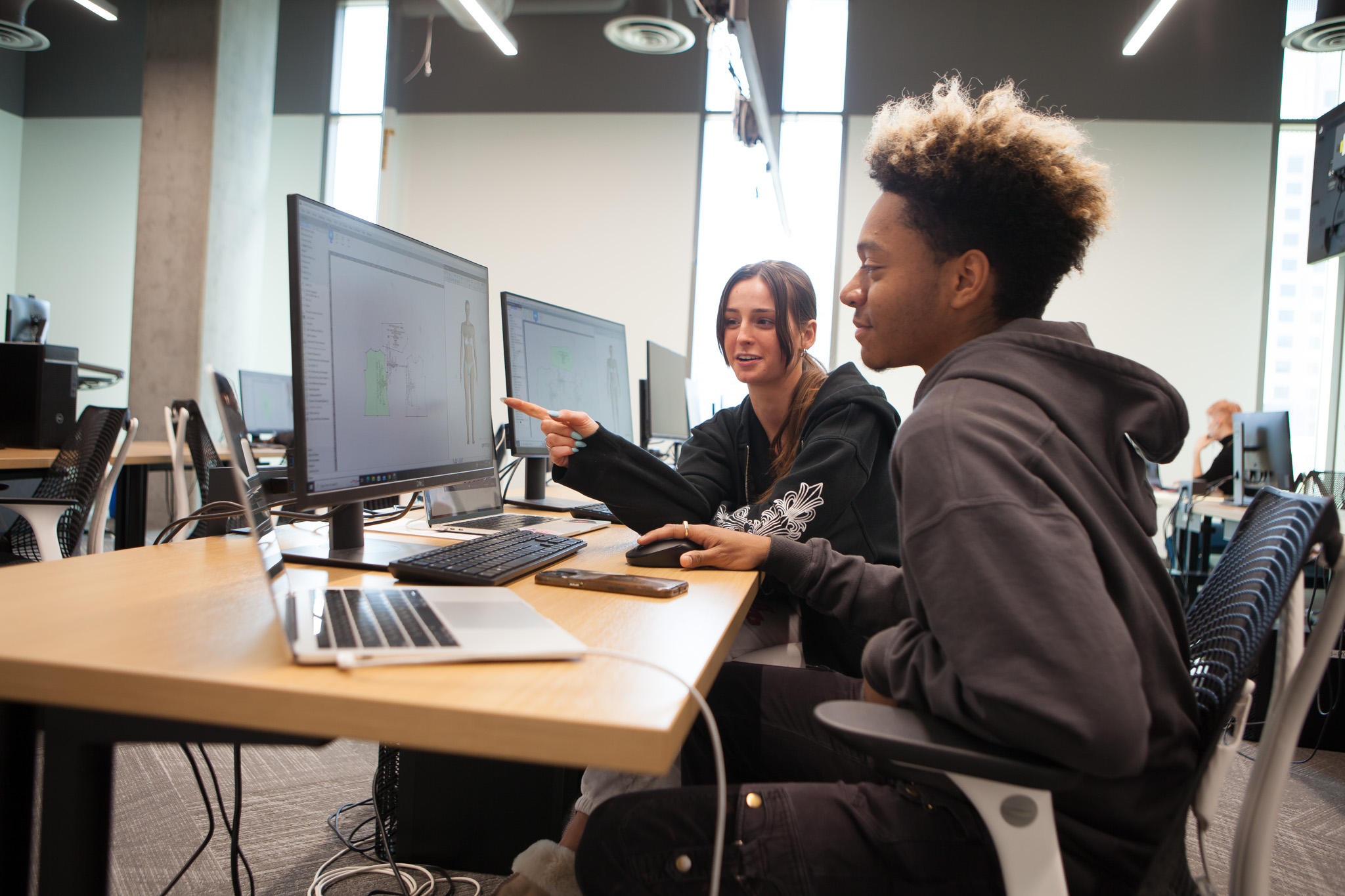 Two students using a computer